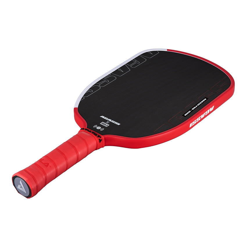 Backhand swing using Agassi paddle on court