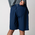 Model in motion wearing JOOLA shorts