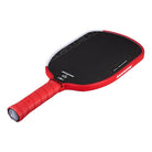 Paddle laying flat with visible carbon fiber surface